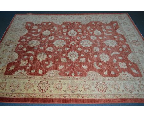 A LARGE LATE 20TH CENTURY 100% WOOLLEN FLORAL GOLD AND RED GROUND CARPET SQUARE, 350cm x 274cm