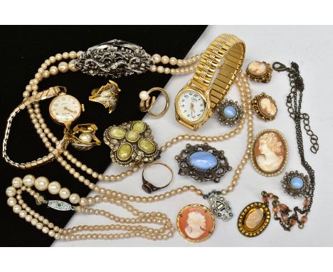 A SELECTION OF MAINLY COSTUME JEWELLERY, to include an oval garnet ring, approximate weight 1.6 grams, two wrist watches, two