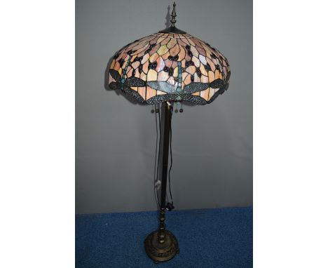 A TIFFANY STYLE STANDARD LAMP, with triple light fittings on a brassed base, diameter 53cm x height 160cm (splits to lead)