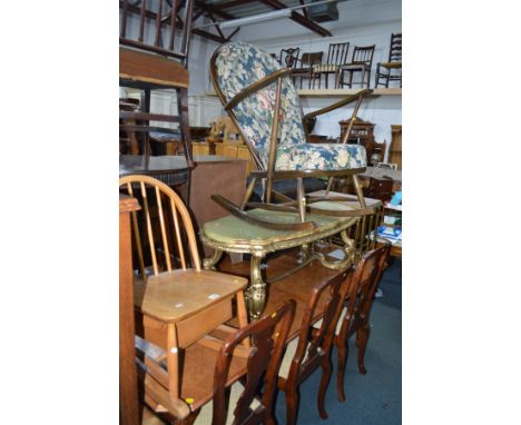 A DARK ERCOL WINDSOR SPINDLE BACK ROCKING CHAIR with removable cushion, together with an Ercol style blonde elm rocking chair