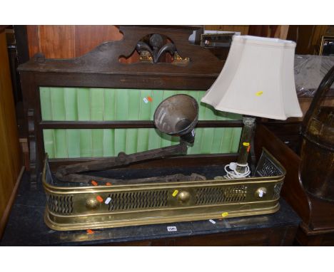 TWO VARIOUS BRASS EXTENDING FENDERS and two fixed brass fenders, together with an early 20th Century brass Corinthian column 