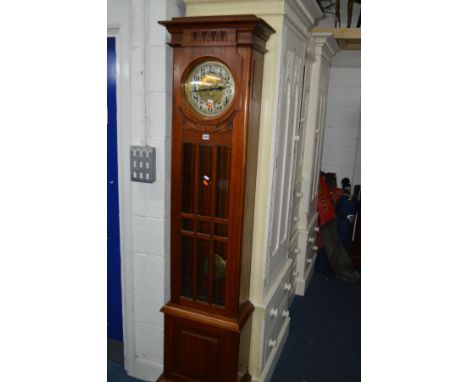 AN EARLY TO MID 20TH CENTURY WALNUT LONGCASE CLOCK, with single door to the movement and trunk, Arabic numerals, height 208cm