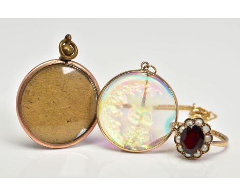 A 9CT GOLD CLUSTER RING AND TWO PENDANTS, the ring designed as a central oval red paste within a split pearl surround, with 9