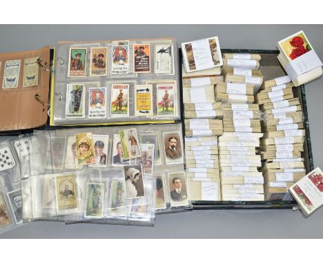 AN ALBUM AND LOCK SPRING BOX containing an eclectic mix of Will's cigarette cards, some of high indivdual value, the album co