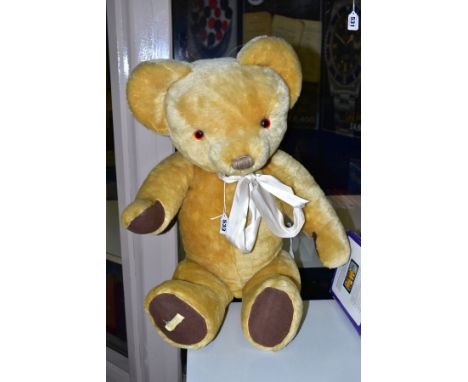 A LARGE MERRYTHOUGHT GOLDEN PLUSH TEDDY BEAR, c.1970's, vertical stitched nose, plastic eyes, jointed body, cloth pads, Merry