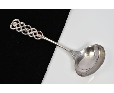 A SCANDINIAVIAN DAVID ANDERSEN LADLE SPOON, the graduated terminal of interlocking knot design, with makers mark, stamped 830