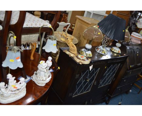 A BRONZED FIGURAL LAMP, two resin figural lamps, a pair of ceramic lamps, an onyx lamp, a 50's lamp shade, a metal lamp, a mo