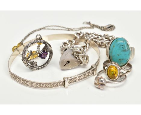SIX ITEMS OF SILVER AND WHITE METAL JEWELLERY, to include an expandable bangle, a turquoise cabochon ring, two further rings,