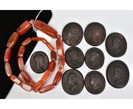 NINE PORTRAIT PANELS AND AN AGATE NECKLACE, the nine black glazed terracotta portrait panels depicting Royalty and soldiers, 