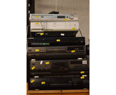 A TECHNICS SL-PG590 CD PLAYER together with a Technics RS-BX501 cassette deck, Panasonic NV-7800 cassette recorder, Kenwood K