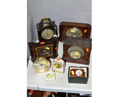 A WOODEN CASED CARRIAGE CLOCK, Jappaned case with Oriental and floral designs applied, Roman numerals, with an electric Smith