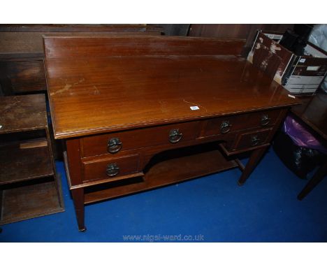 Wooden four drawer buffet on porcelain casters, 49" long x 31" high x 24" deep.