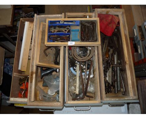 Four large drawers of spanners, tools, Allen keys, etc.,
