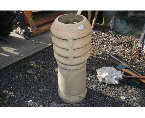 Ceramic chimney pot 37" high x 12" diameter.