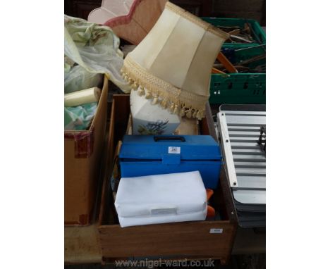 A table lamp, toiletry bag, craft tool box, etc.,