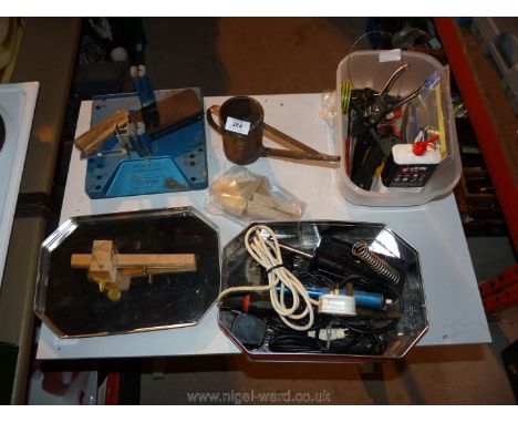 Various soldering irons, saw  guide, saw set, hand tools, etc.,