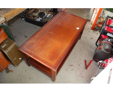 Hardwood coffee table 42" long x 21" wide x 18" high with tower shelf.