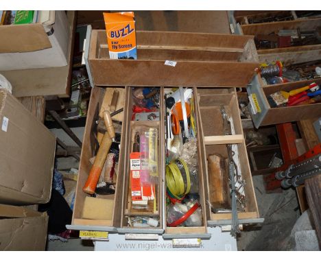 Five drawers of hand tools, wire brush, fixings and fastenings, etc.,