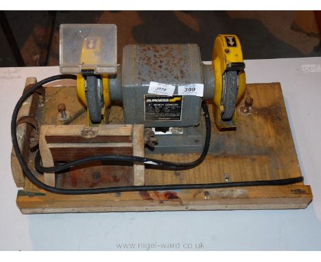 Mounted bench grinder.