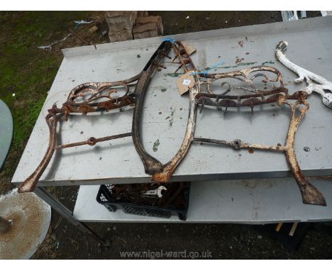 Pair of wrought iron bench ends