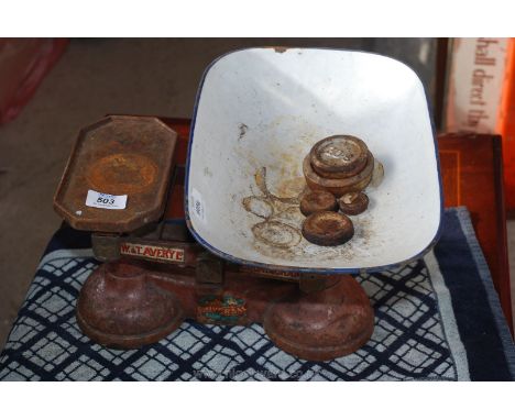 Set of Avery pan scales and small quantity of weights.