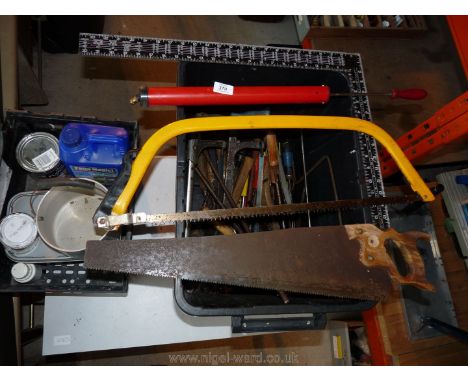 A tub of hand tools, various saws, pump, etc., and a tub of paint oddments.