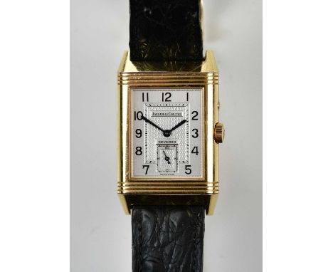 JAEGER-LECOULTRE; a gentleman's 18ct yellow gold Reverso wristwatch with subsidiary seconds hands and Arabic numerals to both