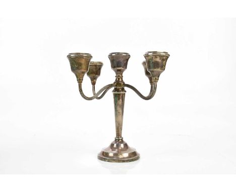 An Elizabeth II hallmarked silver five light candelabrum, Birmingham 1973, loaded base, height 23cm.
