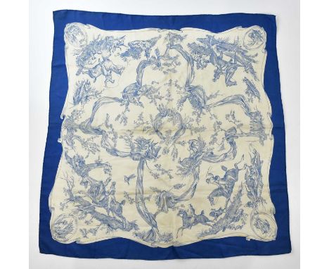 HERMÈS; a vintage 100% silk scarf depicting riders and dog scenes, signed to corner, in cream and blue, 90 x 90cm.Condition R