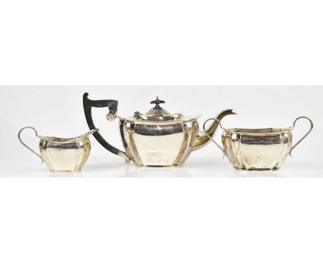 VINERS; a George V hallmarked silver three piece tea service with panel decoration, Sheffield 1927, combined approx 36ozt/111