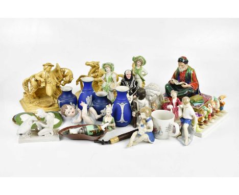 An assortment of decorative ceramics including Reg Johnson figure, two Eichwald figures with gilt decoration, Royal Doulton f