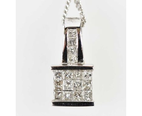 An 18ct white gold and diamond set pendant with four diamonds to the bail and twelve diamonds to the pendant drops suspended 