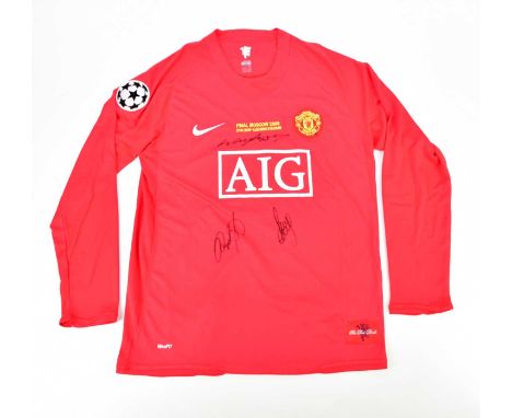 MANCHESTER UNITED; a 2008 retro style football shirt, signed to the front by Rooney, Giggs and Scholes, size L.Condition Repo