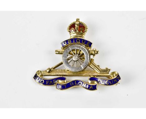 A 9ct yellow and white gold enamel decorated sweetheart brooch for the Royal Artillery, length 35mm, approx. 5.8g. 