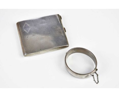 A silver engraved hinged snap bangle, af, and a silver cigarette case inscribed 'Ken', af, (2), combined approx 5.47ozt/170.3