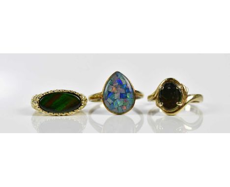 A 14ct yellow gold doublet opal dress ring, size R, approx. 6.2g, a 14ct yellow gold dress ring, size L, approx. 4.9g, and a 