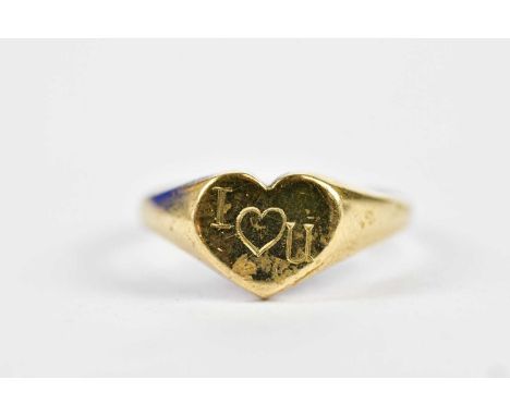 A 9ct yellow gold ring with heart shaped platform inscribed 'I ♡ You', size K 1/2, approx 1.93g. 