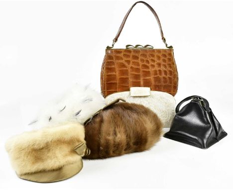 THE MARTIN; a circa 1950s vintage brown crocodile skin handbag with top handles and brass tone top closure, an unusual vintag
