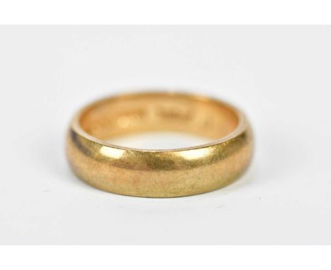 A 9ct yellow gold wedding band, size K, approx. 4.2g. 