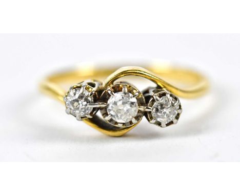 An 18ct yellow gold and platinum three stone diamond dress ring, size K 1/2, approximate weight 2.4g.