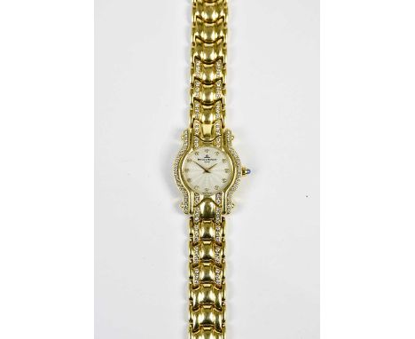 BAUME &amp; MERCIER; a lady's 18ct gold and diamond set wristwatch, the engine turned dial set with diamond dots, on a yellow