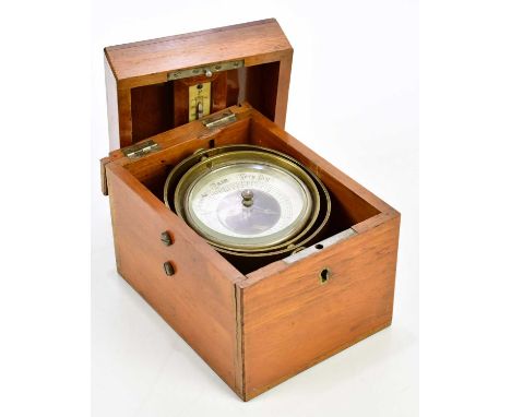 A cased binnacle barometer and thermometer.