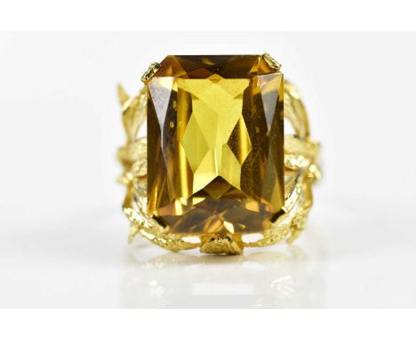 A yellow metal and citrine large dress ring, size K, approx. 6.86g.Condition Report: Overall condition is good