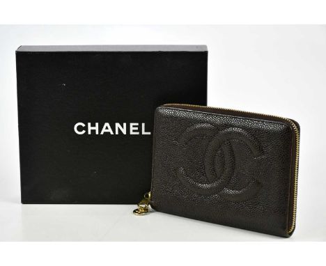 CHANEL; a vintage brown caviar leather purse wallet with internal zip pockets, seven card holes, serial number sticker to int