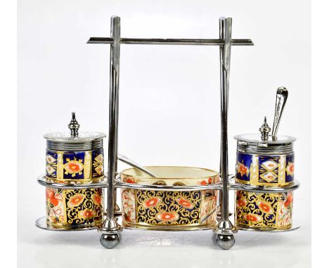 JAMES DEAKIN &amp; SONS; an Arts and Crafts silver plated condiment set with Davenport Imari ceramic liners.