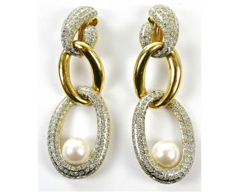 VALENTINO; a pair of large circa 1980s vintage gold tone drop chain design clip-on earrings embellished with crystals and a l