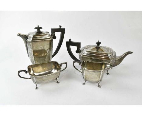 JOSEPH GLOSTER LTD; a George VI hallmarked silver four piece tea service with chased decoration to the corners, Birmingham 19