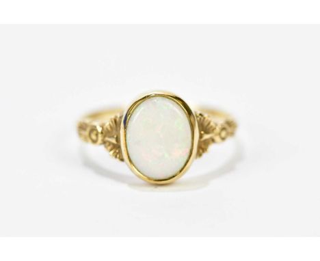 A 9ct yellow gold collet set opal ring, size O, approx. 2.6g. 