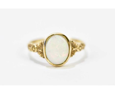 A 9ct yellow gold collet set opal ring, size O, approx. 2.6g. 