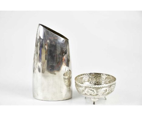 An 830 grade silver footed bowl, repoussé decorated with floral detail, and a Cypriot white metal vase of ovoid form, height 